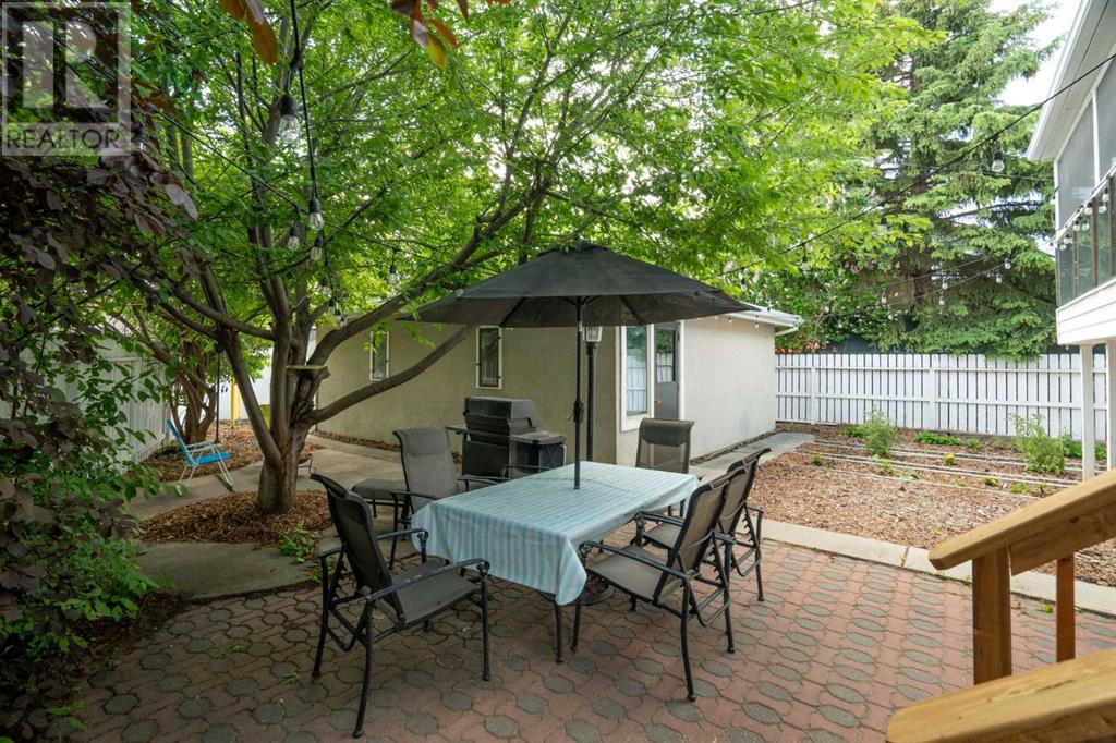 Single Family House Bi-level for Sale in  Bearspaw Drive NW Brentwood Calgary 