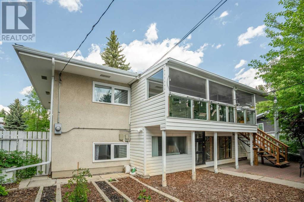 Single Family House Bi-level for Sale in  Bearspaw Drive NW Brentwood Calgary 
