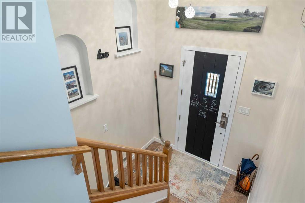 Single Family House Bi-level for Sale in  Bearspaw Drive NW Brentwood Calgary 