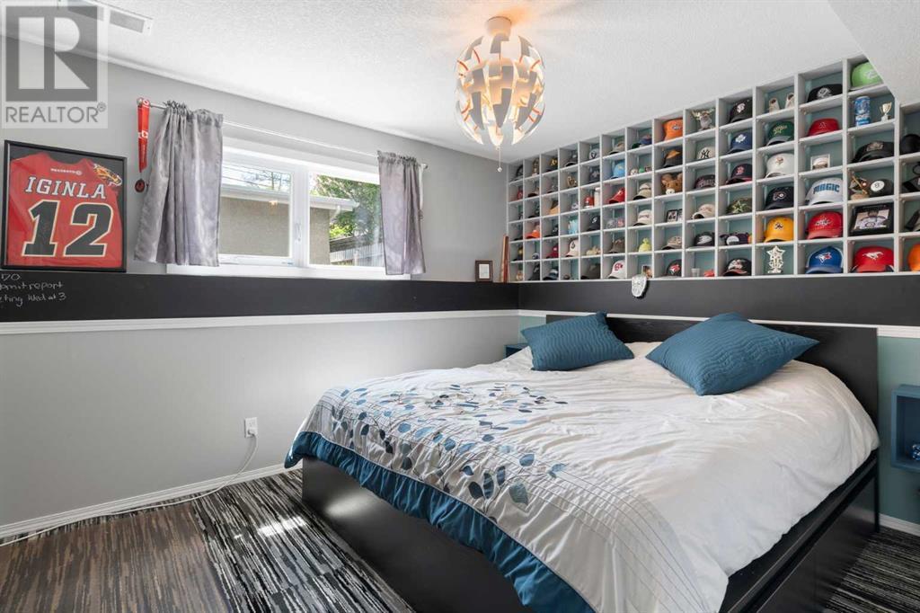 Single Family House Bi-level for Sale in  Bearspaw Drive NW Brentwood Calgary 