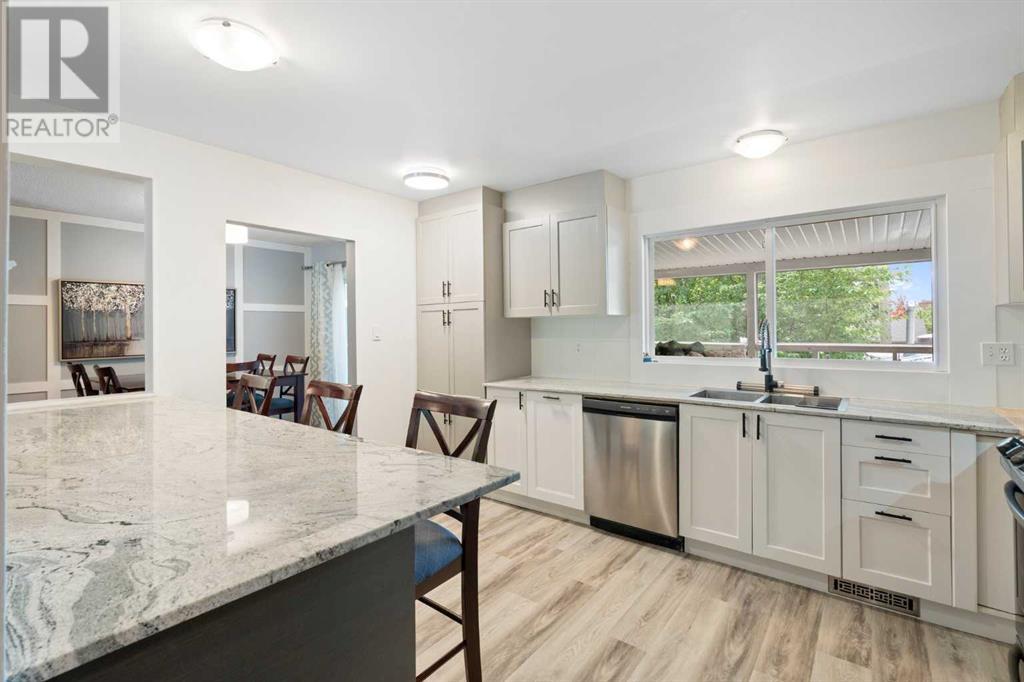 Single Family House Bi-level for Sale in  Bearspaw Drive NW Brentwood Calgary 