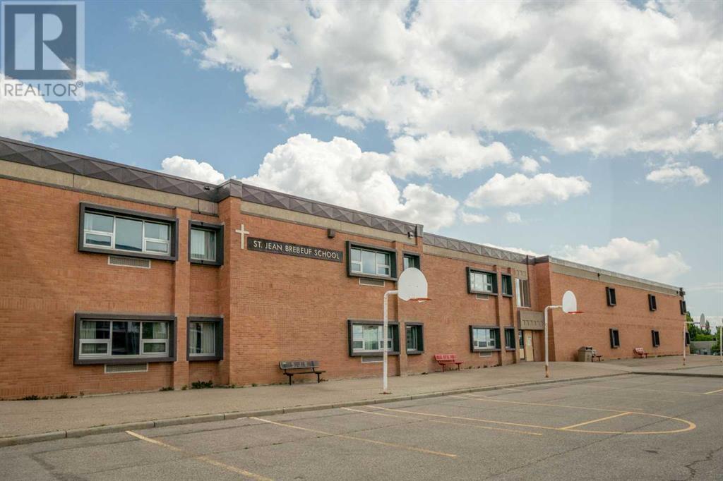 Single Family House Bi-level for Sale in  Bearspaw Drive NW Brentwood Calgary 