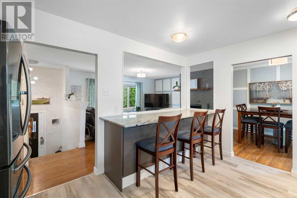 Single Family House Bi-level for Sale in  Bearspaw Drive NW Brentwood Calgary 