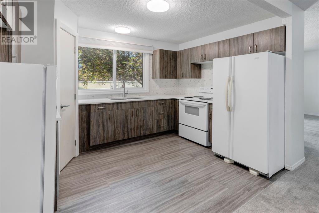 Single Family House for Sale in   Manora Place NE Marlborough Park Calgary 