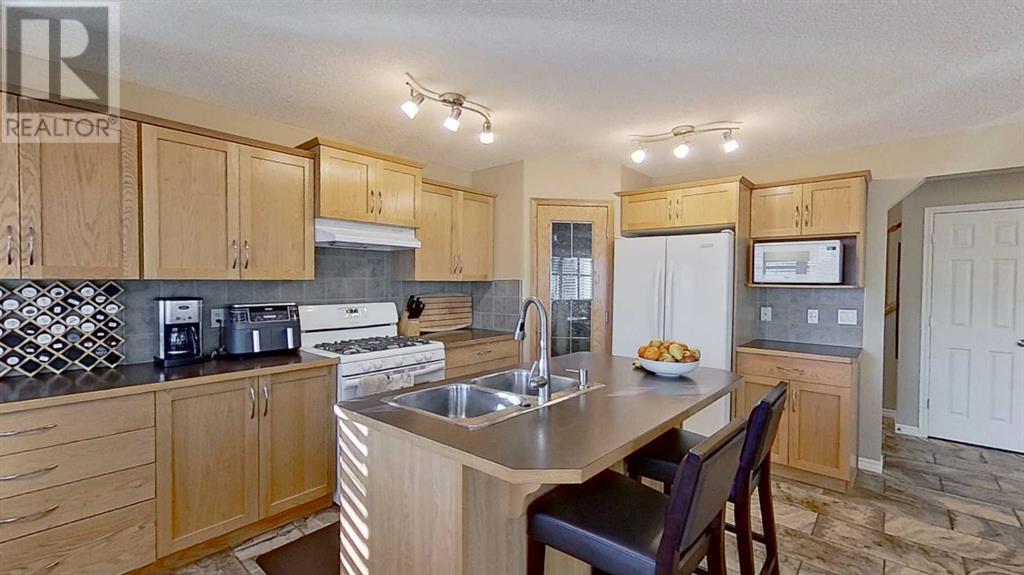 Photo 19 of 9 Prairie Springs Close Sw, Airdrie AB