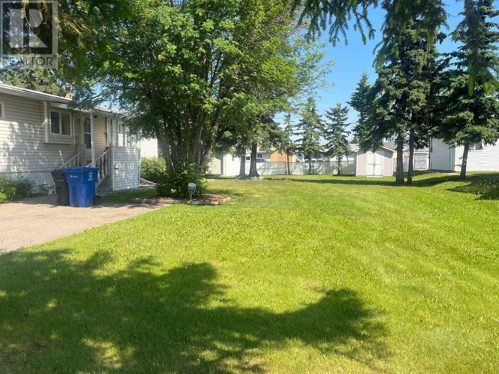 Photo 5 of 9012 9016 101 Avenue, Fort St John BC