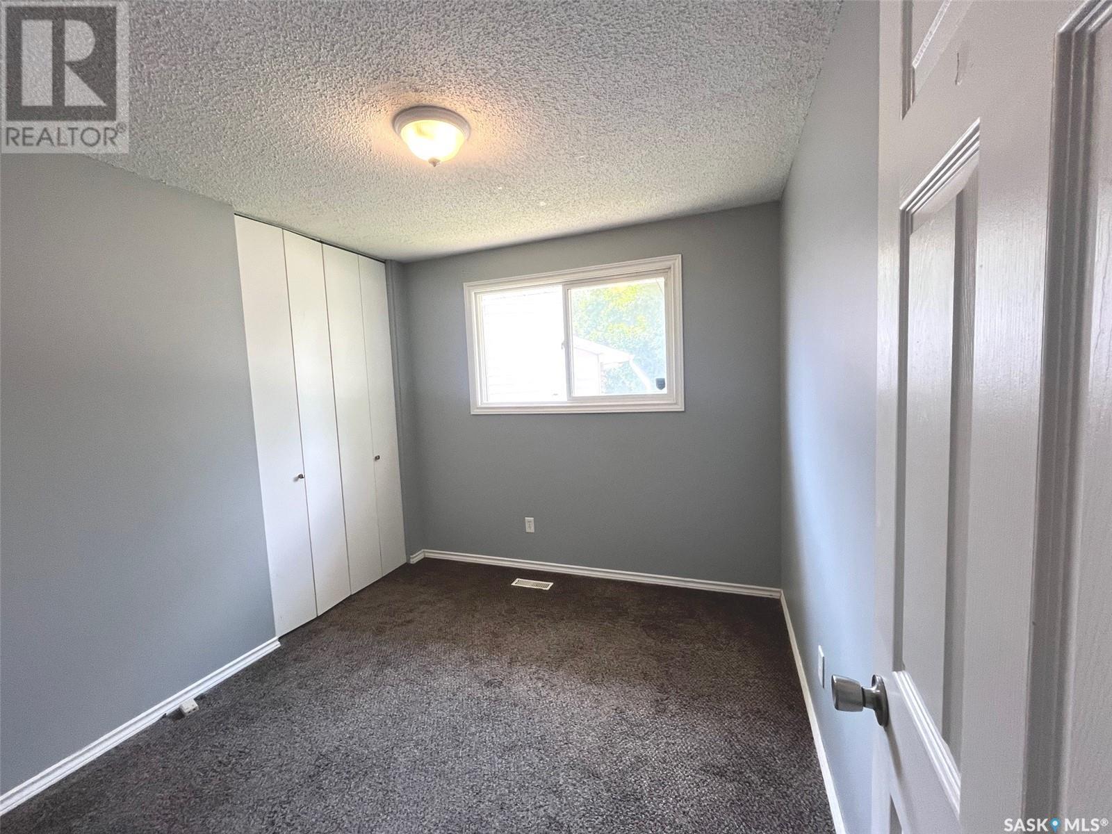 Photo 9 of 119 Mikkelson Drive, Regina SK
