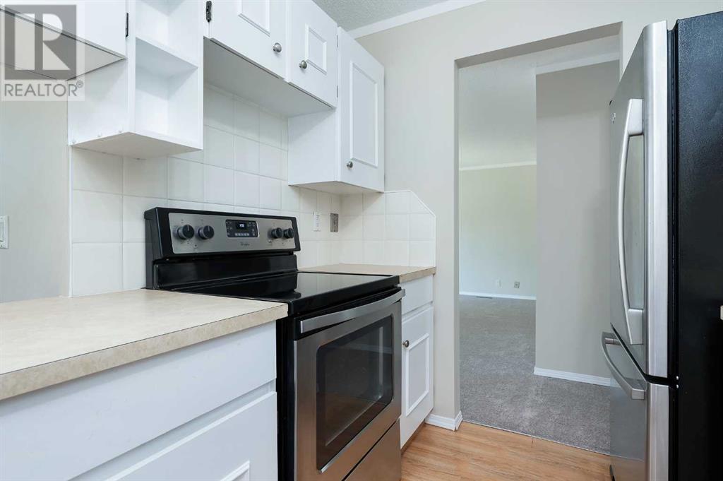 Single Family House Bungalow for Sale in  Macewan Park Road NW MacEwan Glen Calgary 