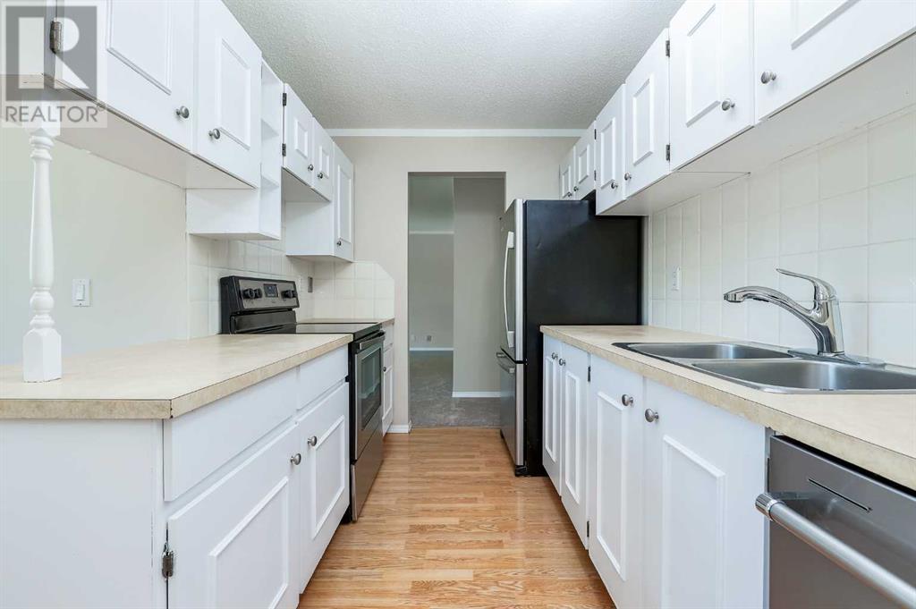 Single Family House Bungalow for Sale in  Macewan Park Road NW MacEwan Glen Calgary 
