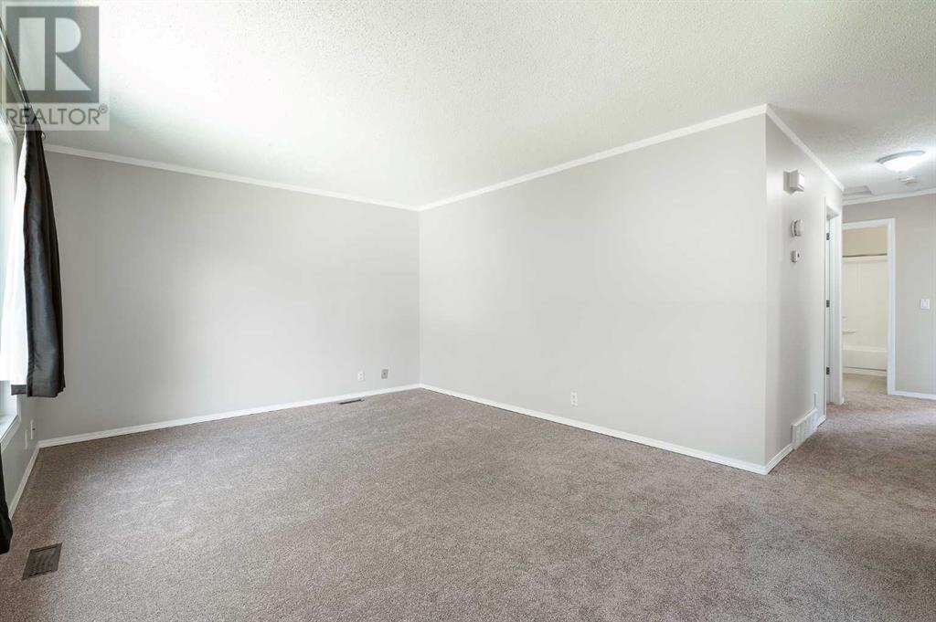 Single Family House Bungalow for Sale in  Macewan Park Road NW MacEwan Glen Calgary 