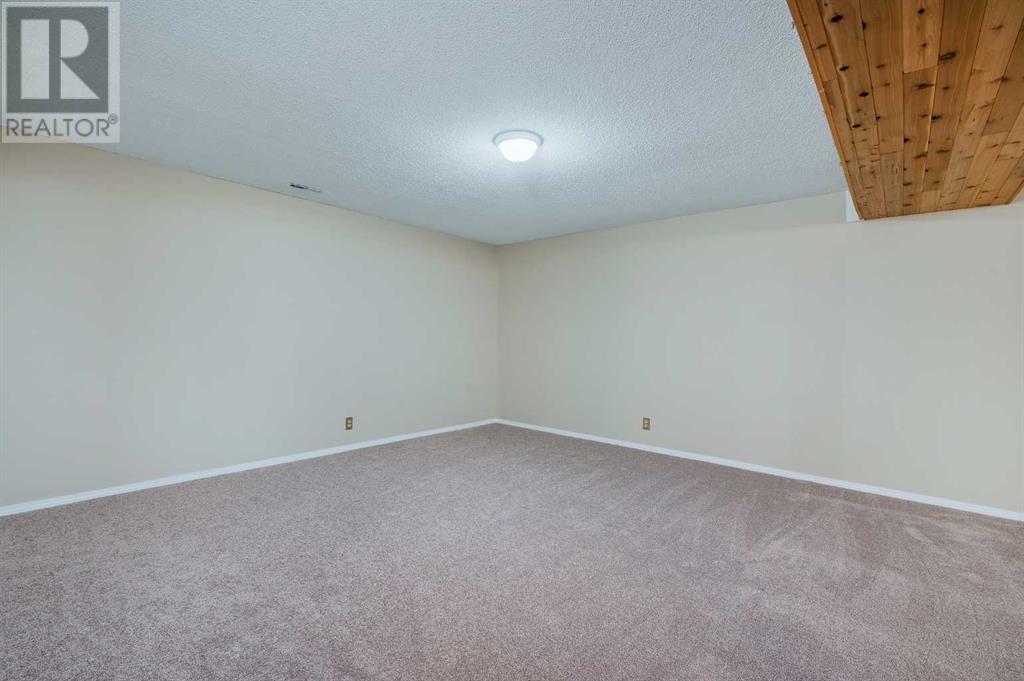 Single Family House Bungalow for Sale in  Macewan Park Road NW MacEwan Glen Calgary 