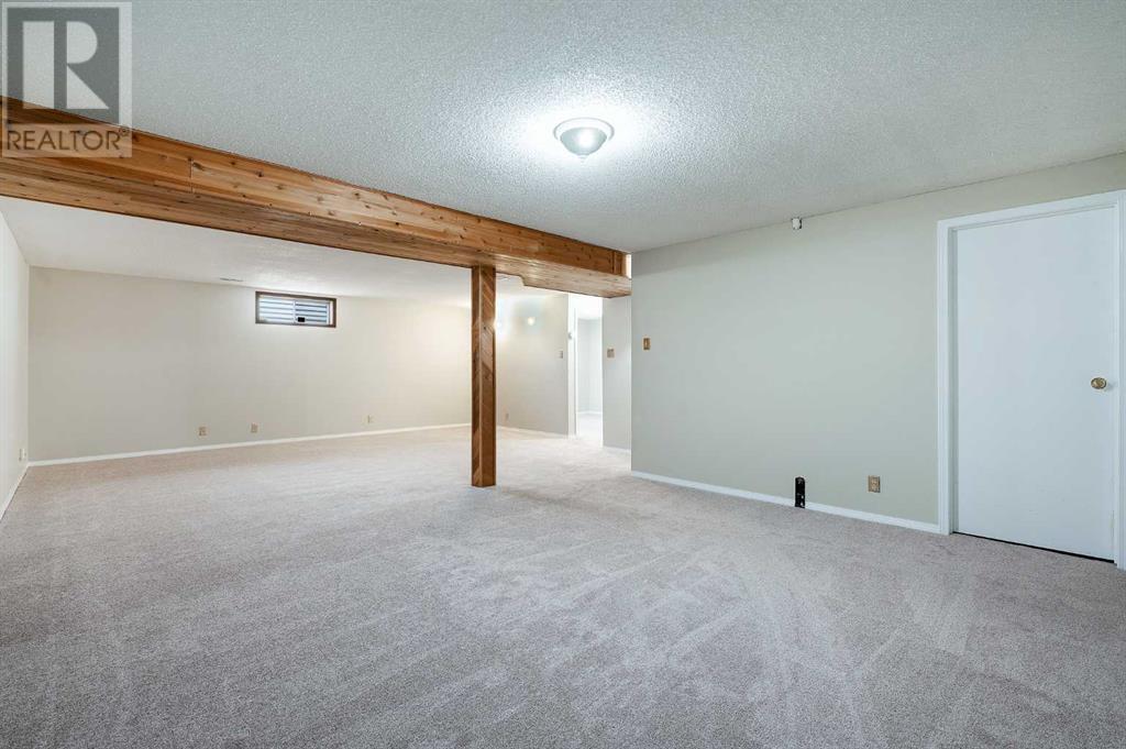 Single Family House Bungalow for Sale in  Macewan Park Road NW MacEwan Glen Calgary 