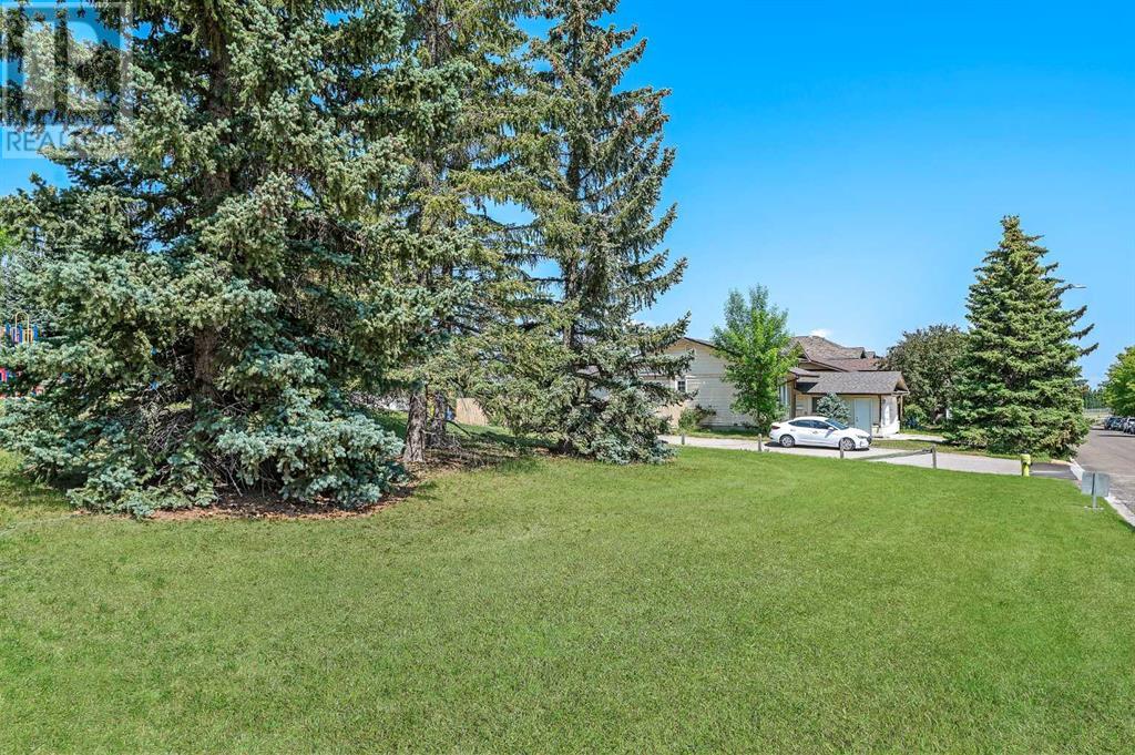 Single Family House Bungalow for Sale in  Macewan Park Road NW MacEwan Glen Calgary 