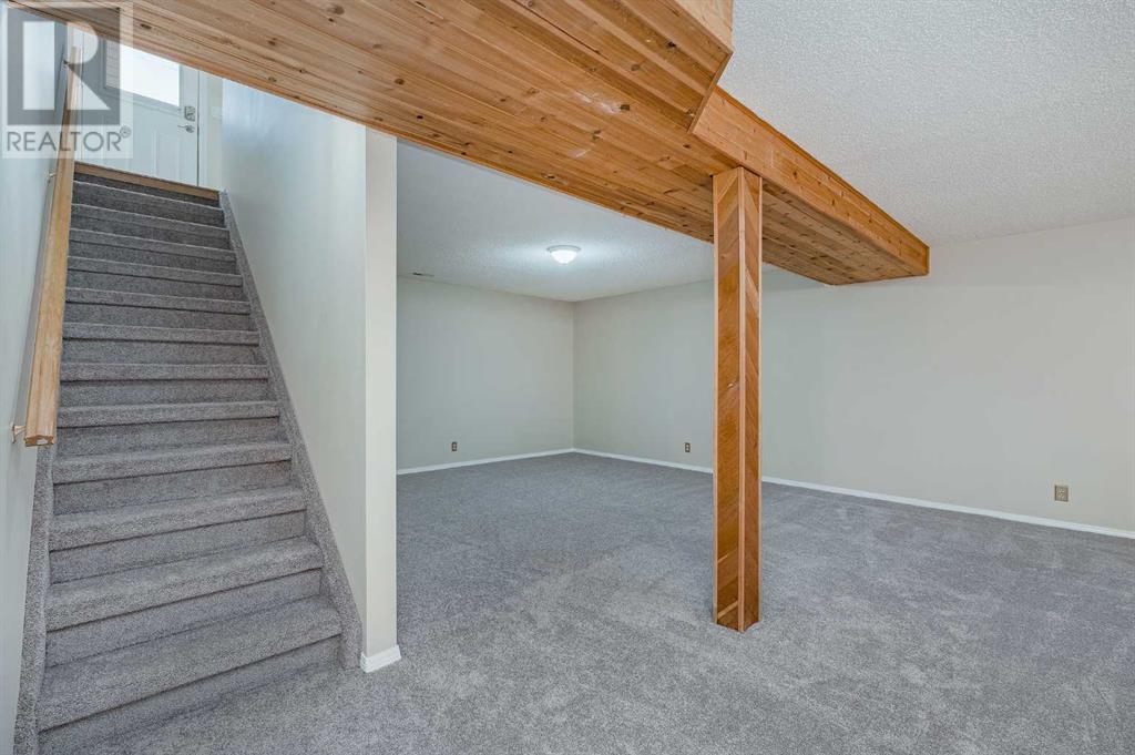 Single Family House Bungalow for Sale in  Macewan Park Road NW MacEwan Glen Calgary 