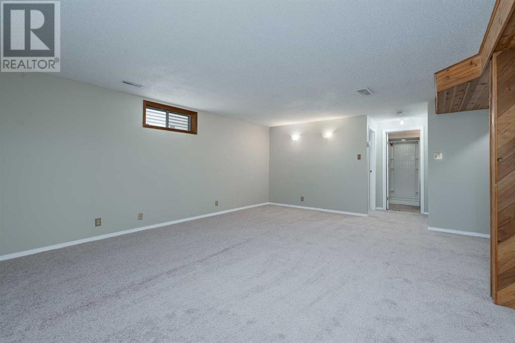 Single Family House Bungalow for Sale in  Macewan Park Road NW MacEwan Glen Calgary 