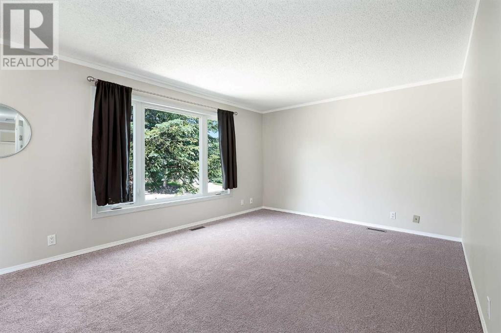Single Family House Bungalow for Sale in  Macewan Park Road NW MacEwan Glen Calgary 