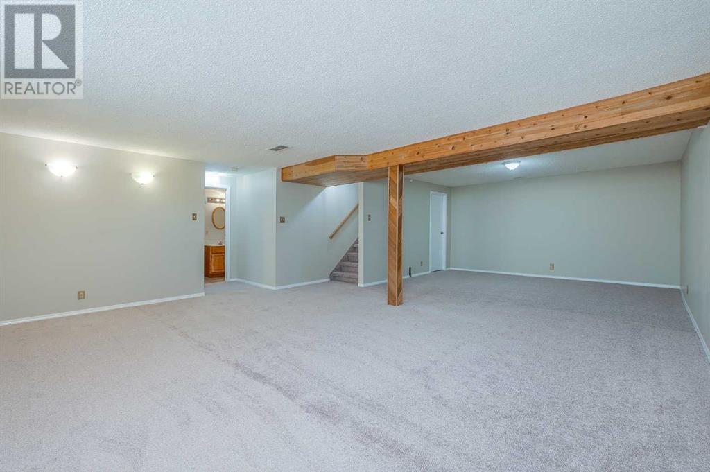 Single Family House Bungalow for Sale in  Macewan Park Road NW MacEwan Glen Calgary 