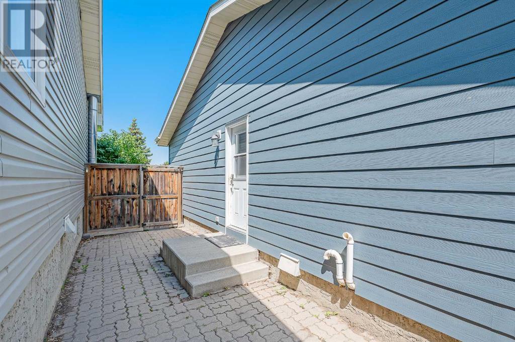 Single Family House Bungalow for Sale in  Macewan Park Road NW MacEwan Glen Calgary 