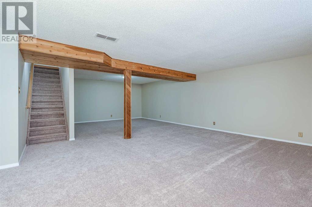 Single Family House Bungalow for Sale in  Macewan Park Road NW MacEwan Glen Calgary 