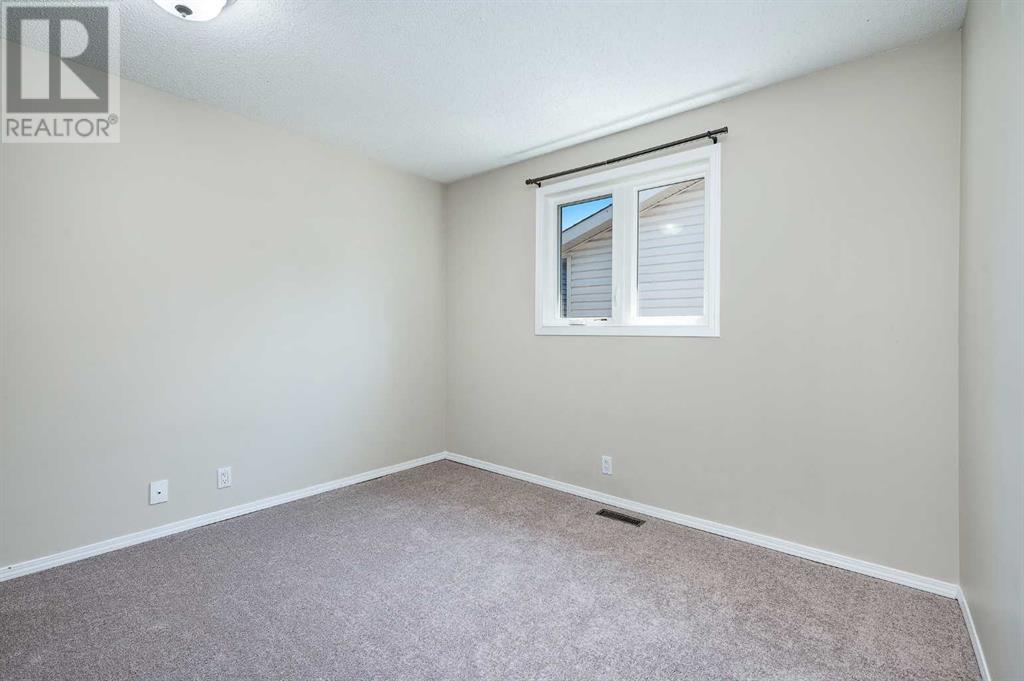 Single Family House Bungalow for Sale in  Macewan Park Road NW MacEwan Glen Calgary 
