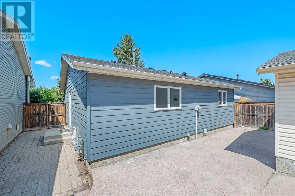 Single Family House Bungalow for Sale in  Macewan Park Road NW MacEwan Glen Calgary 