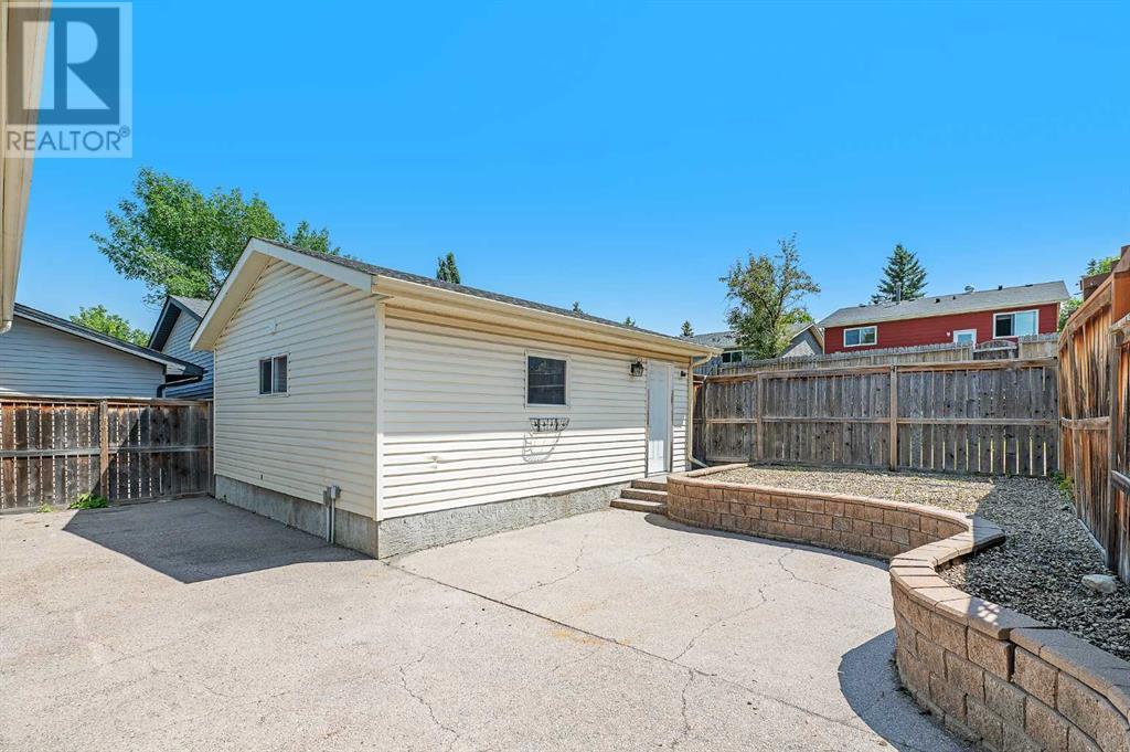 Single Family House Bungalow for Sale in  Macewan Park Road NW MacEwan Glen Calgary 