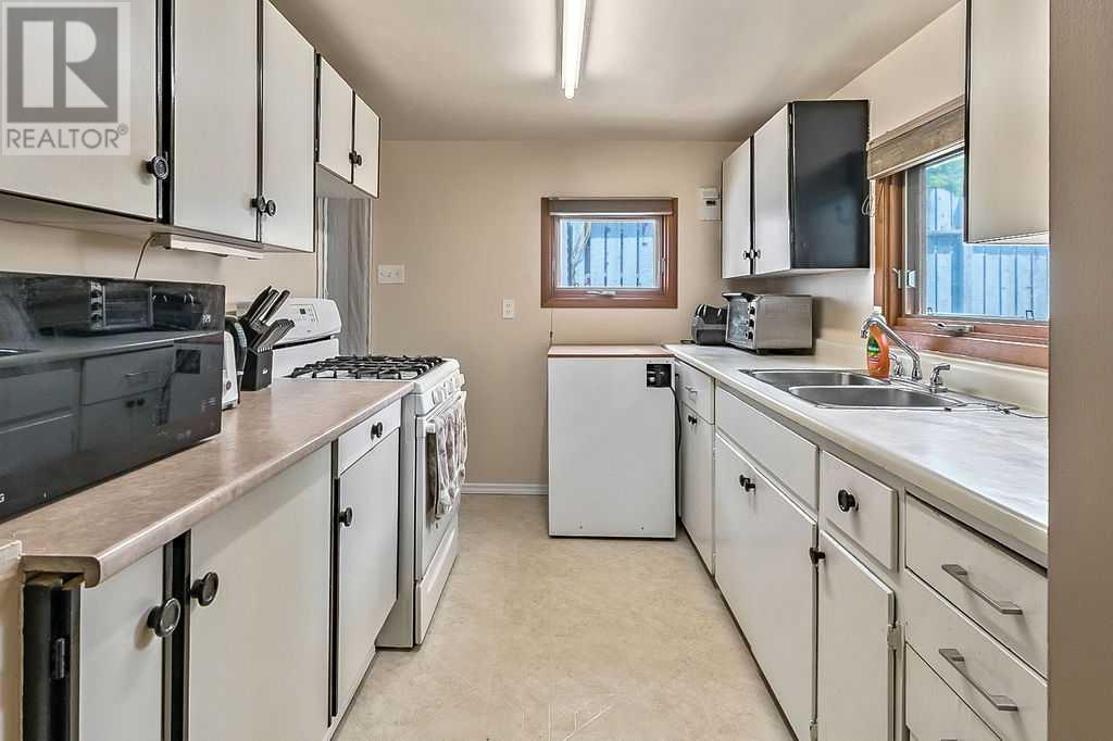 Single Family House Bungalow for Sale in   Avenue NW Montgomery Calgary 