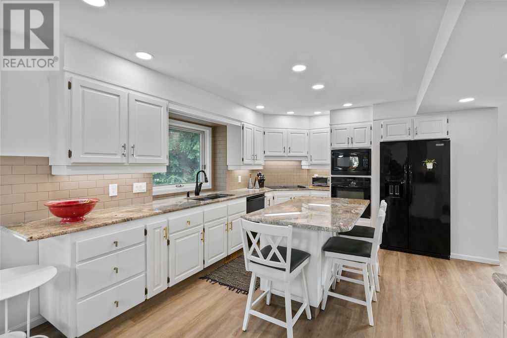 Single Family House for Sale in  Woodbriar Circle SW Woodbine Calgary 