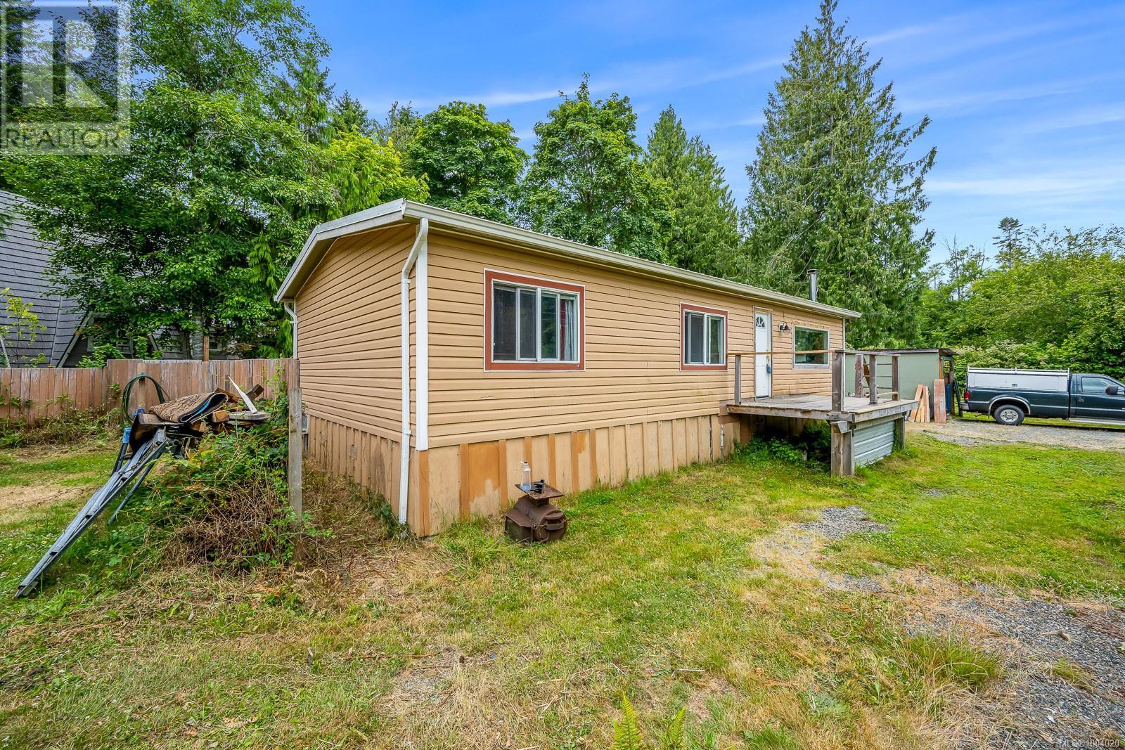 Photo 1 of 7865 Ships Point Rd, Fanny Bay BC
