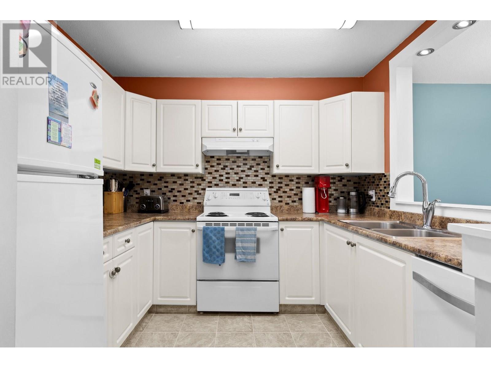 Photo 5 of 400 Sutton Crescent Unit 209, Kelowna BC