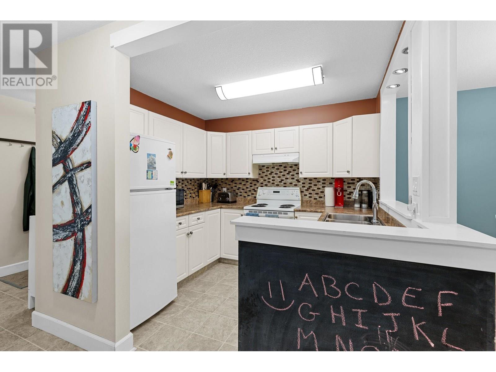 Photo 12 of 400 Sutton Crescent Unit 209, Kelowna BC