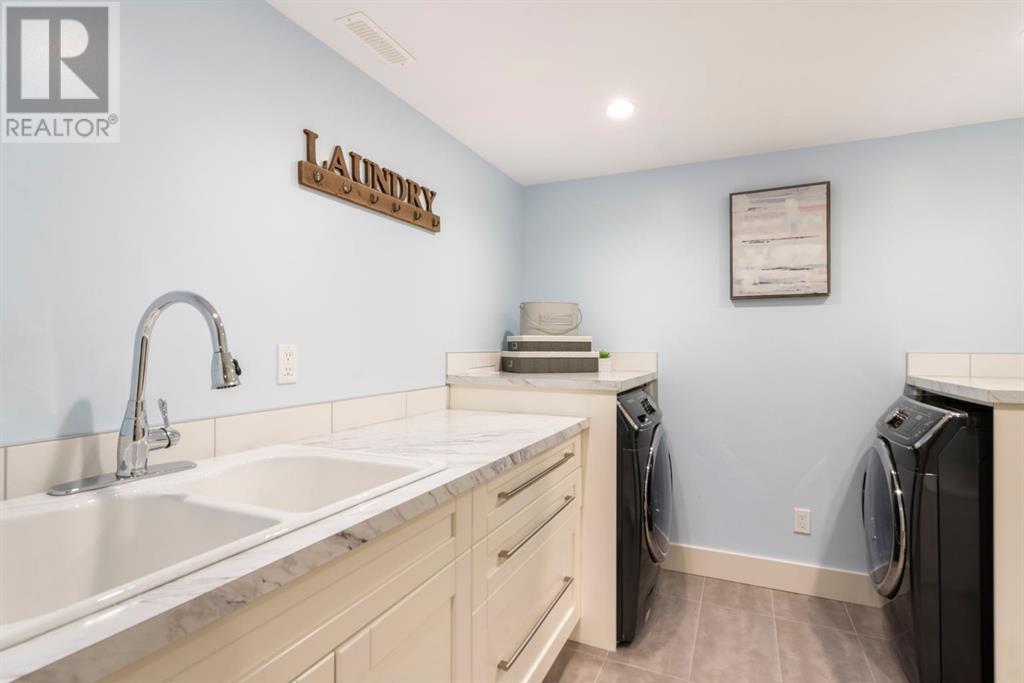 Single Family House Bungalow for Sale in  Grove Hill Place SW Glendale Calgary 