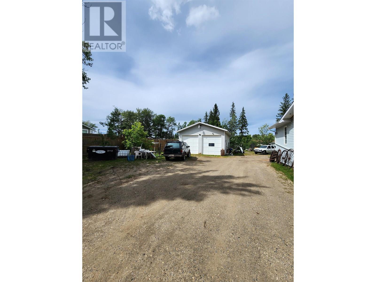 Photo 5 of 12208 Oak Avenue, Fort St John BC