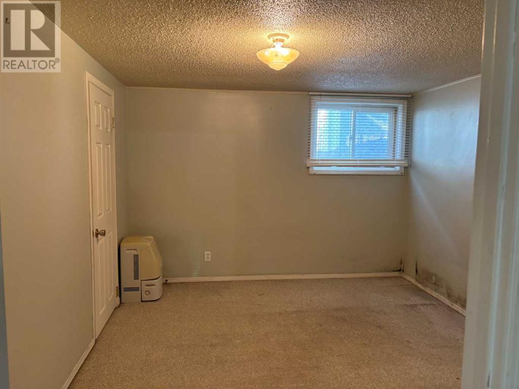 Single Family House Bungalow for Sale in  Halifax Crescent NW Banff Trail Calgary 