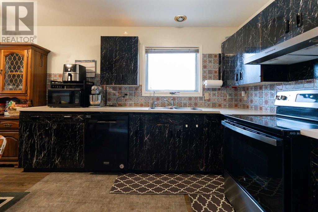 Single Family House Bungalow for Sale in  Cassino Street S Glendale Lethbridge 