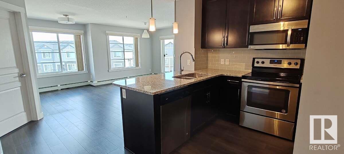 #302 3670 139 AV NW - 11