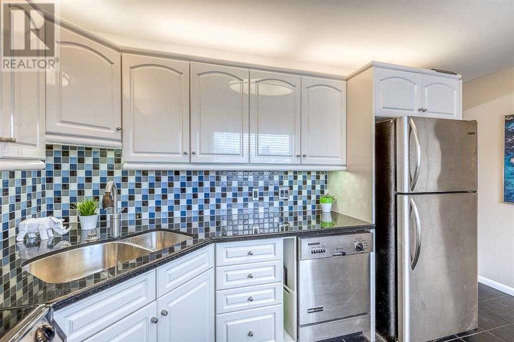 Single Family House Bungalow for Sale in  Grove Hill Road SW Glendale Calgary 