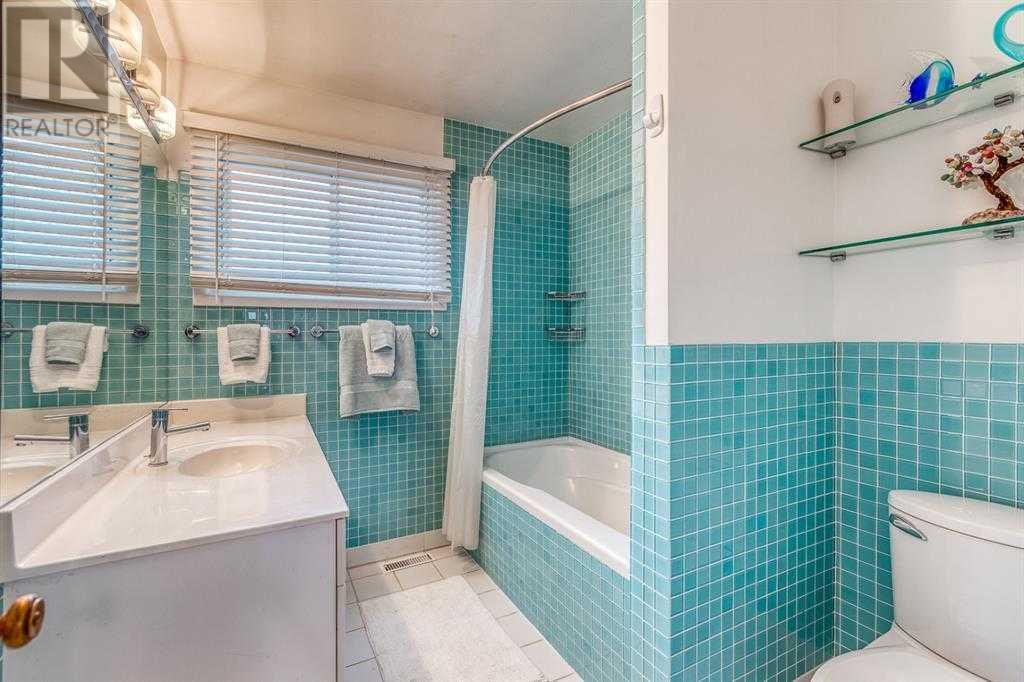 Single Family House Bungalow for Sale in  Grove Hill Road SW Glendale Calgary 