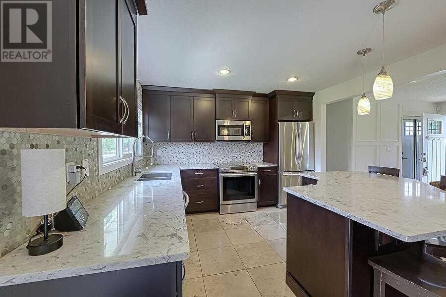 Single Family House Bungalow for Sale in  Hollyburn Road SW Haysboro Calgary 
