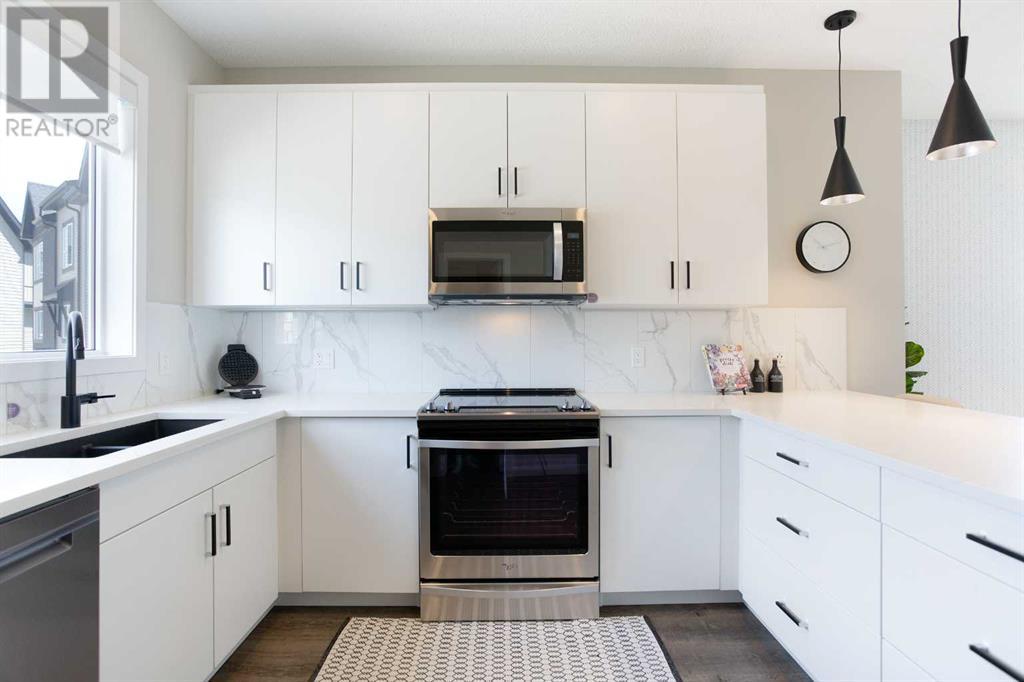 Photo 4 of 896 Belmont Drive Sw, Calgary AB