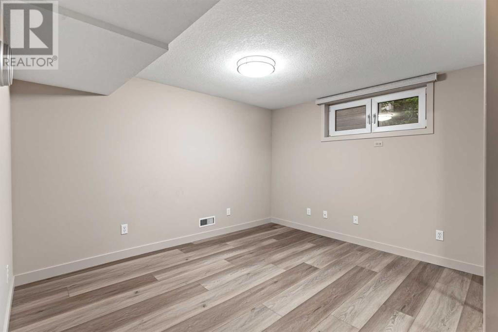 Single Family House Bungalow for Sale in  Granlea Place SW Glendale Calgary 