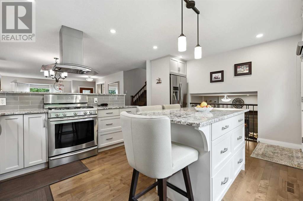 Single Family House 4 Level for Sale in  Hawkcliff Way NW Hawkwood Calgary 