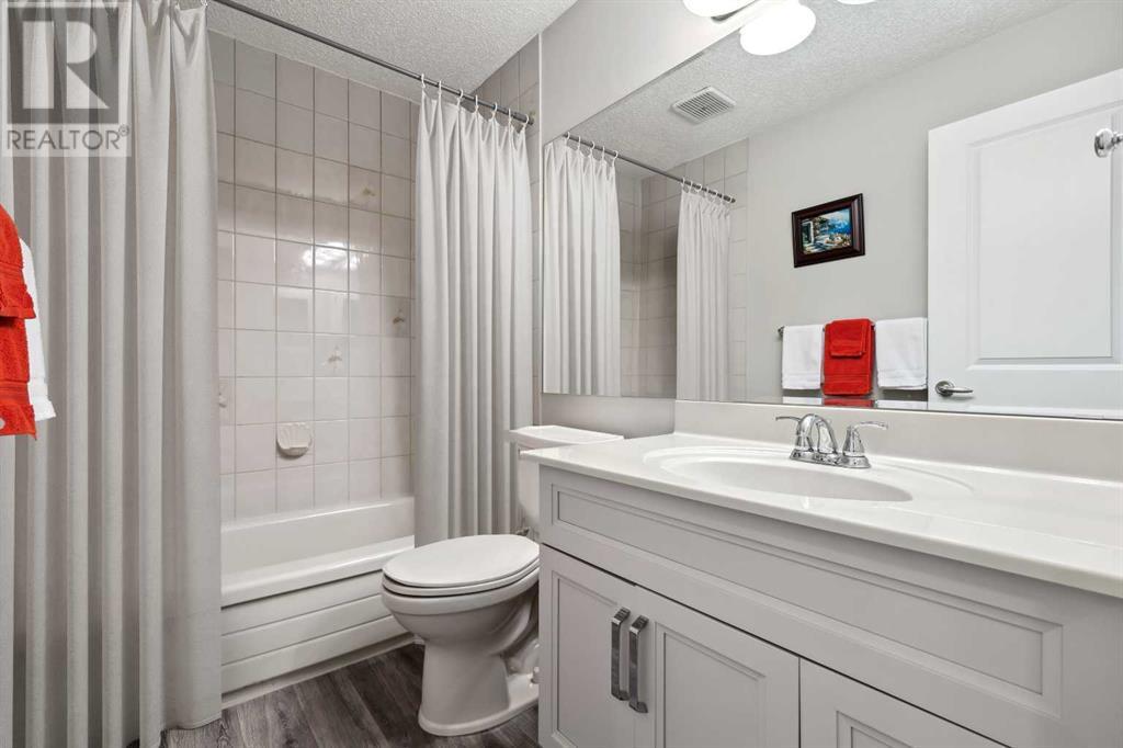 Single Family House 4 Level for Sale in  Hawkcliff Way NW Hawkwood Calgary 