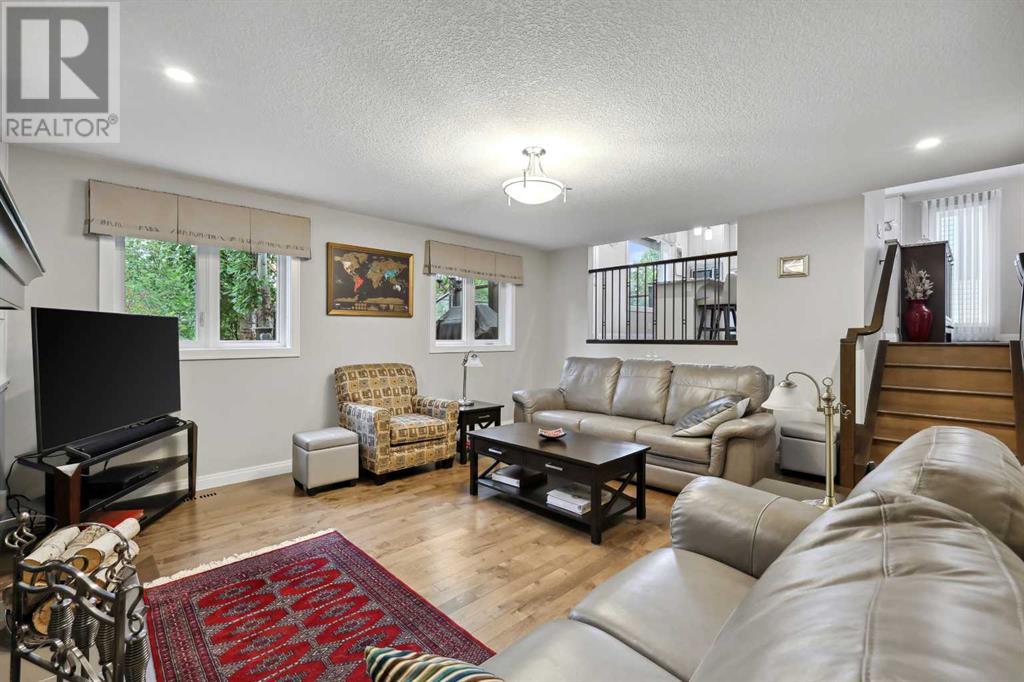 Single Family House 4 Level for Sale in  Hawkcliff Way NW Hawkwood Calgary 