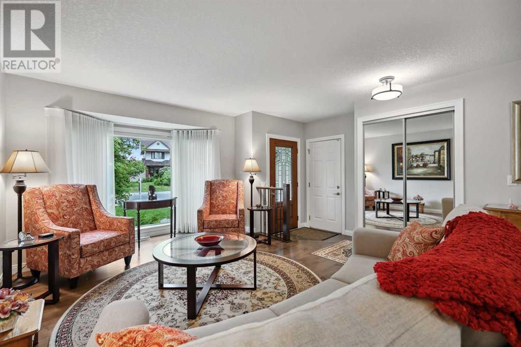 Single Family House 4 Level for Sale in  Hawkcliff Way NW Hawkwood Calgary 
