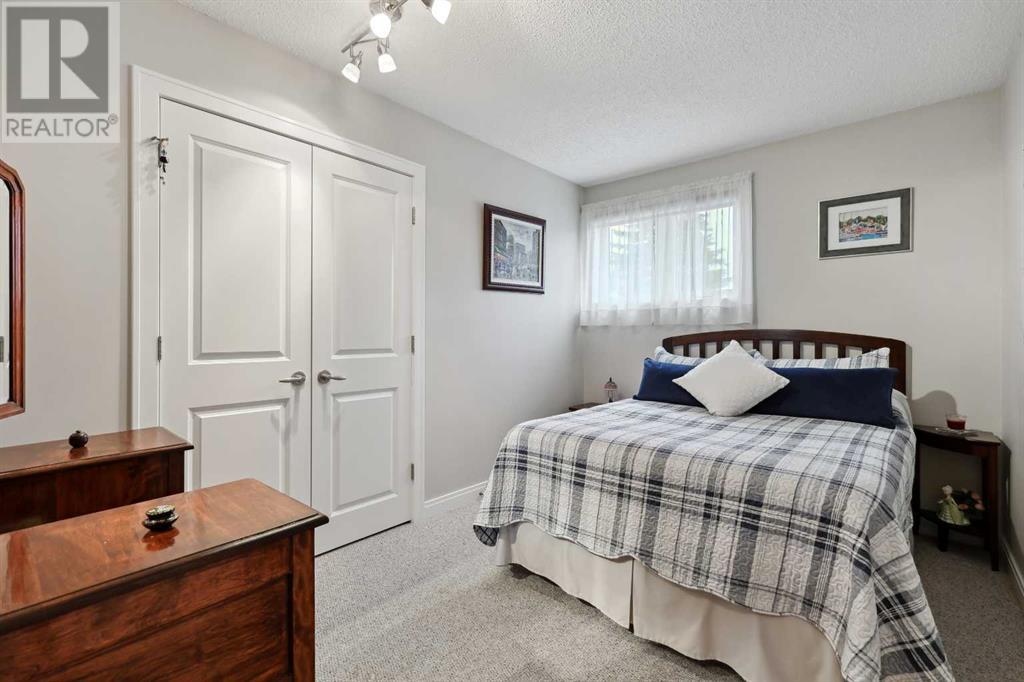 Single Family House 4 Level for Sale in  Hawkcliff Way NW Hawkwood Calgary 
