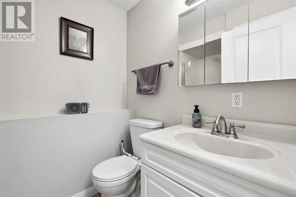 Single Family House 4 Level for Sale in  Hawkcliff Way NW Hawkwood Calgary 