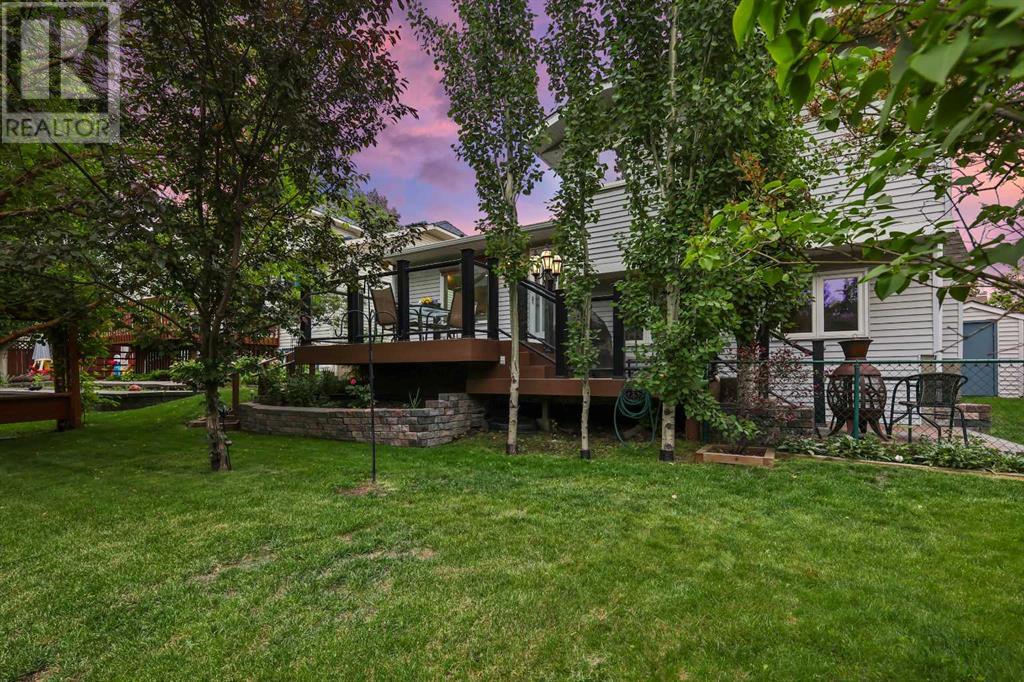 Single Family House 4 Level for Sale in  Hawkcliff Way NW Hawkwood Calgary 