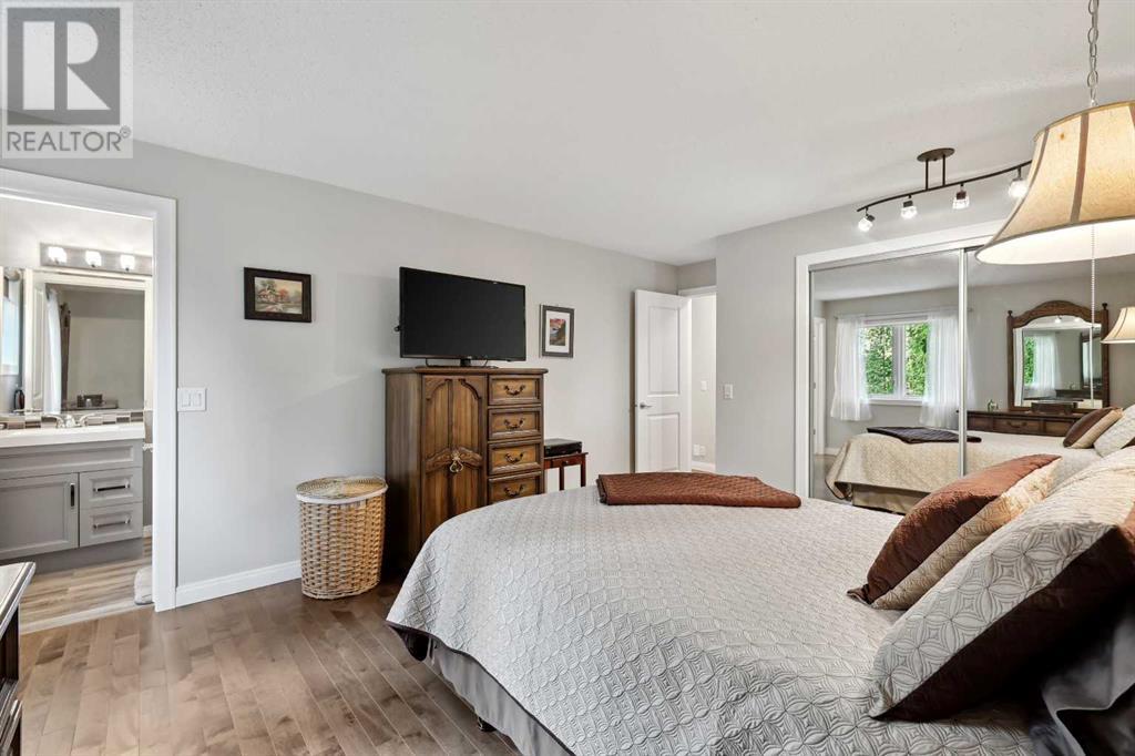 Single Family House 4 Level for Sale in  Hawkcliff Way NW Hawkwood Calgary 