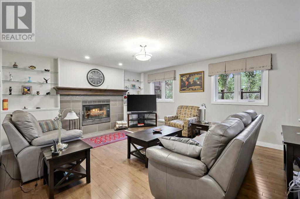 Single Family House 4 Level for Sale in  Hawkcliff Way NW Hawkwood Calgary 
